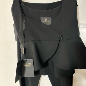 Set of two pieces, elegant black pants with top. Never was worn.